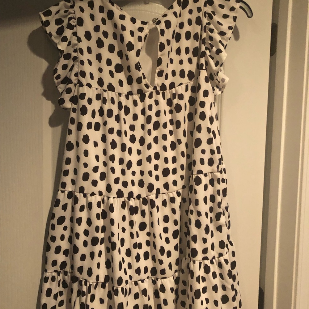 Beautiful flutter sleeve dress. Worn 1 time.